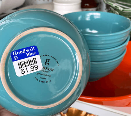 Photo of blue bowls on a shelf.