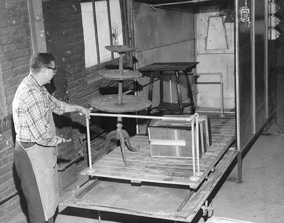 Goodwill employee unloading donated furniture